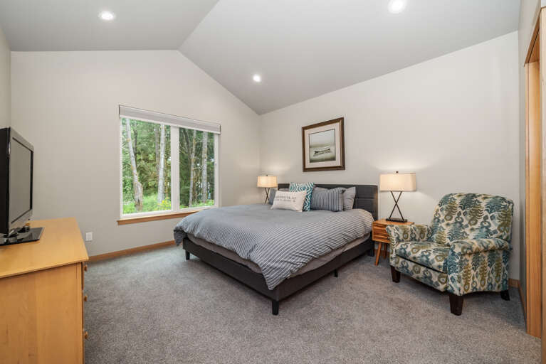 Master bedroom with King bed, Streaming TV with Spectrum Cable,  attached full bath with walk in shower. 