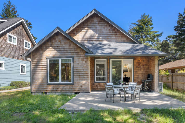 Outdoor patio with Gas BBQ, Patio seating, and a view of the 6th hole on the Golf Course. 