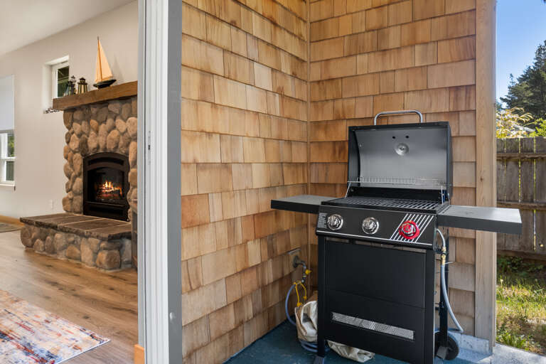 Outdoor patio with Gas BBQ, Patio seating, and a view of the 6th hole on the Golf Course. 