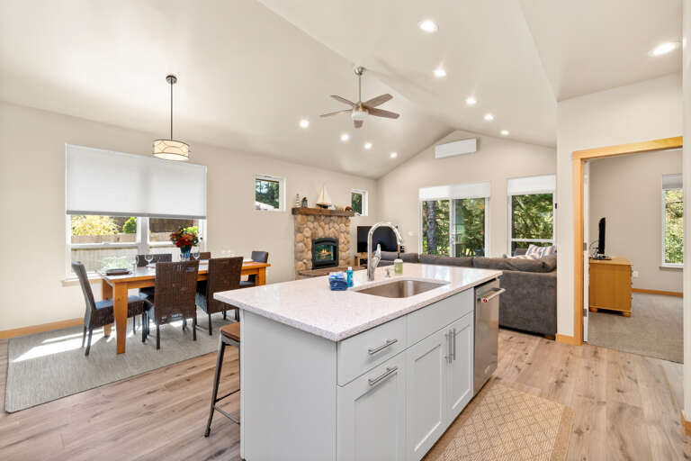 Breakfast bar island open to the dining and living area. 