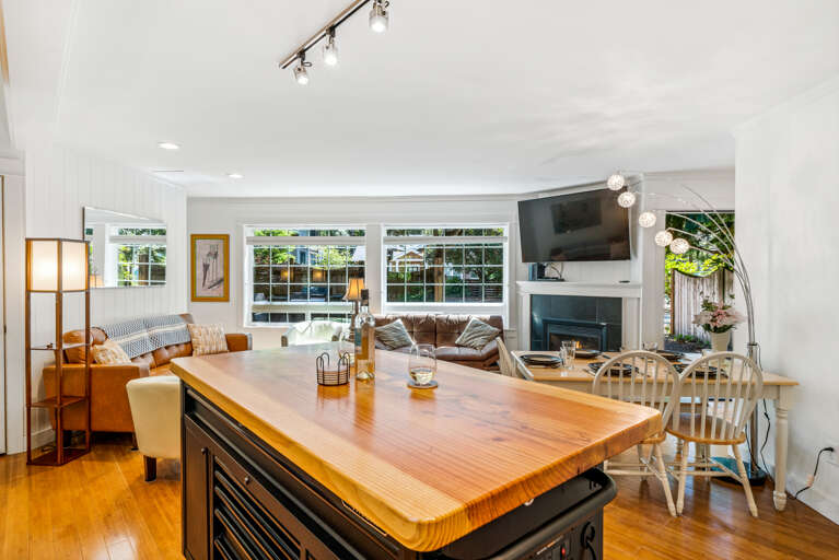 Open Living area with fully equipped kitchen including a Viking Gas range, Breakfast Bar, Dishwasher, Microwave