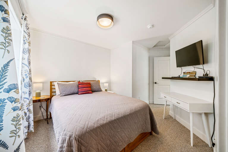 2nd story queen bedroom with Roku TV streaming