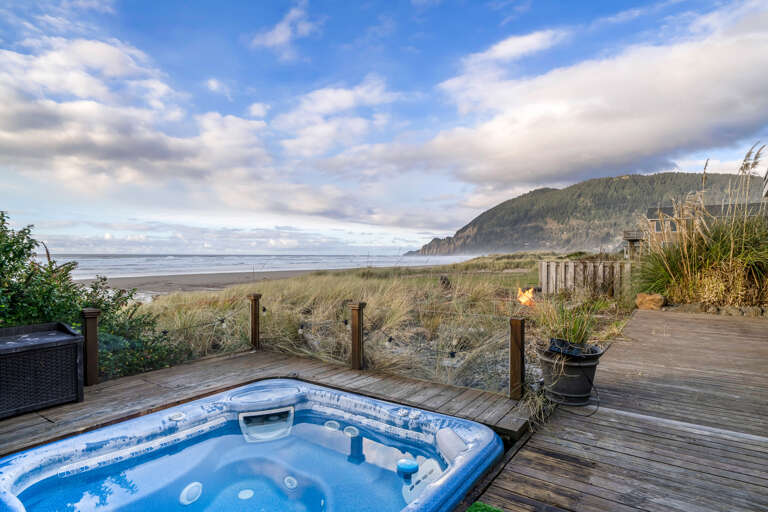 Ocean and mountain views from the hot tub and outdoor firepit