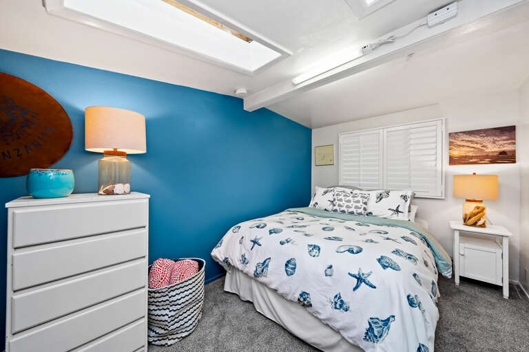 Cabana room with queen bed and twin with trundle. 