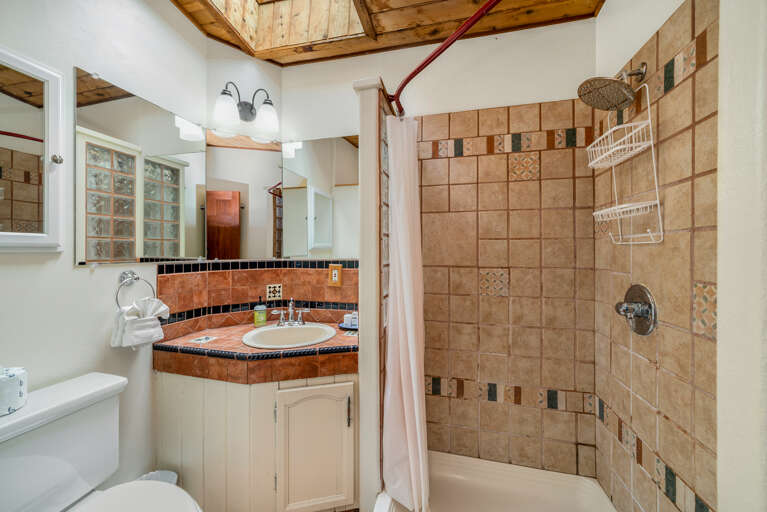 Full bath with Shower and Stackable washer/dryer