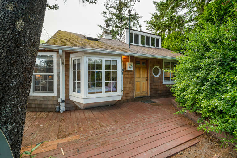 Entry area with outdoor hot and cold shower. 