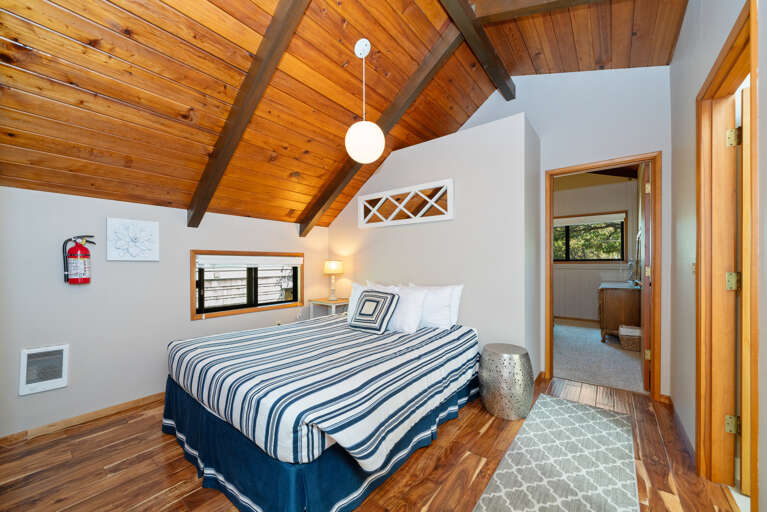 Loft Queen bed across from hall bathroom