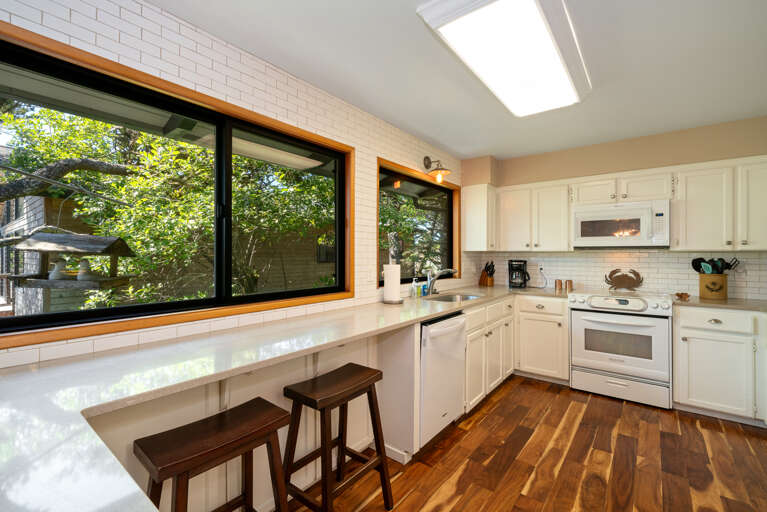 Large open kitchen with breakfast bar area