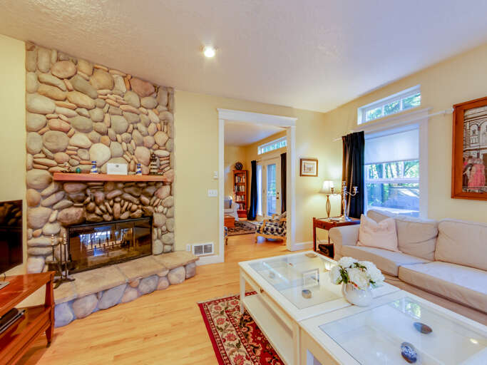 Living room with pass through double sided fireplace, TV 