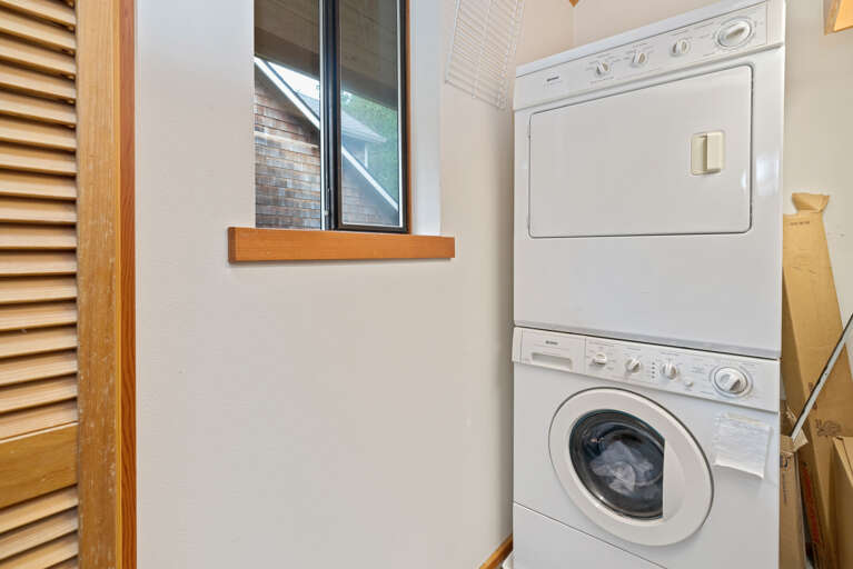 Main floor full bath with tub/shower and laundry