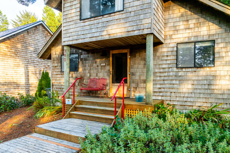 Lovely covered porch to have your morning coffee on.