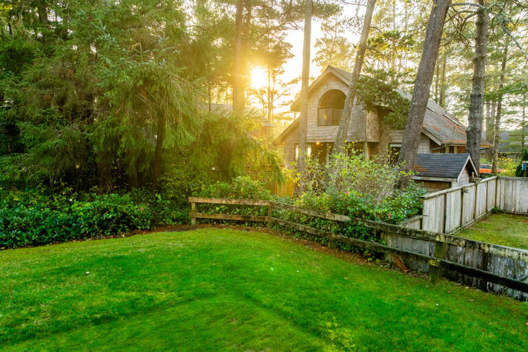 Located on the back golf course greens with views from the back yard area that is partially fenced and has a private hot tub