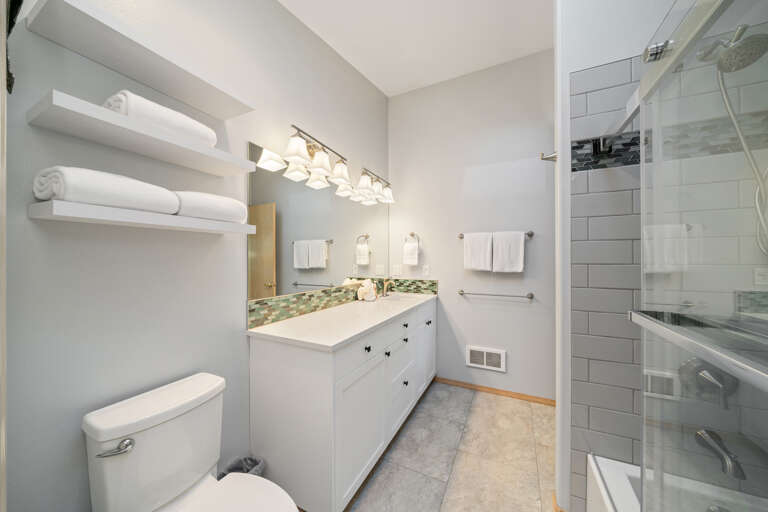 Master bath/access from kitchen and master bedroom. 