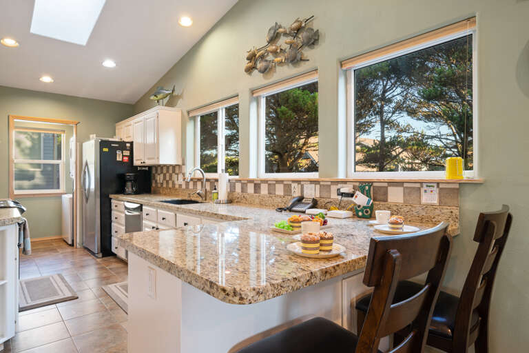 Large kitchen with breakfast bar and All new appliances coming soon.