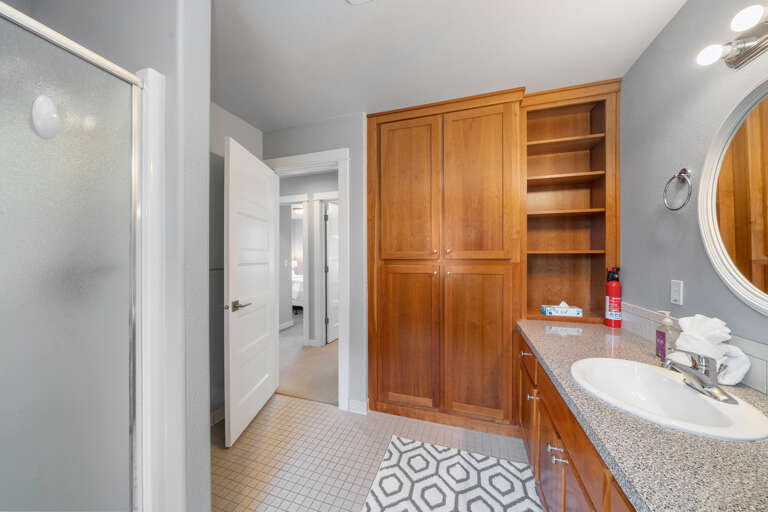 Mid level full bath with Stall shower. 