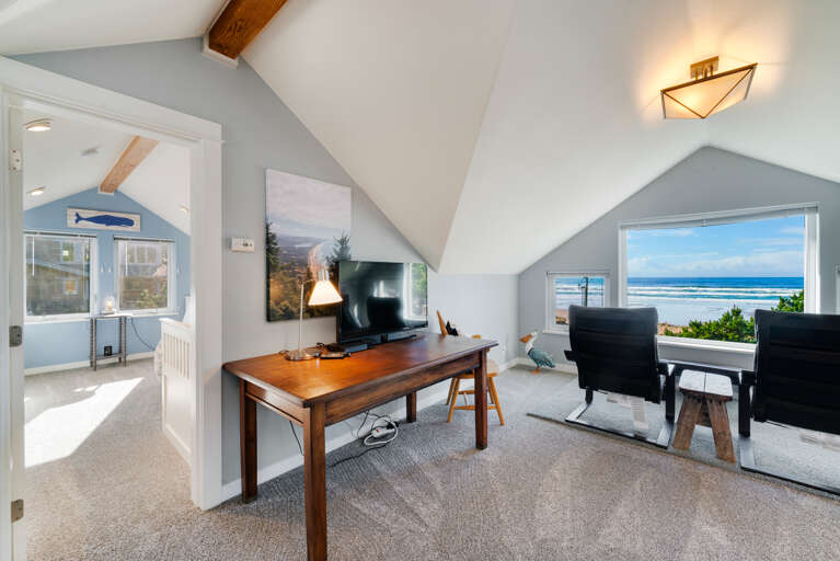 Third floor family room with Oceanview, work desk and TV