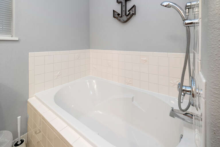 Downstairs main floor bath with Tub and Stall shower. 