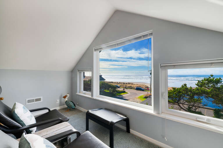 Third floor family room with Oceanview, work desk and TV