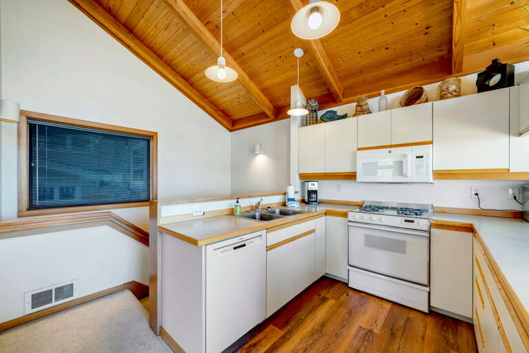 Gorgeous views from the fully equipped kitchen with a breakfast bar. 