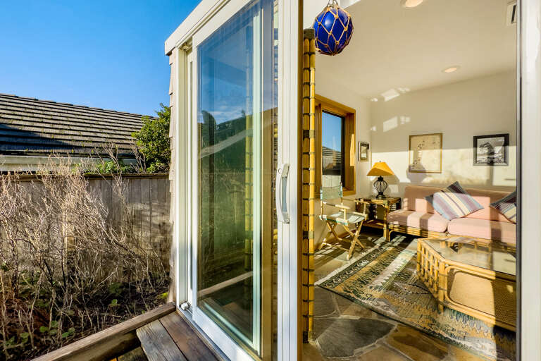 Sunroom with access to the shared outdoor patio