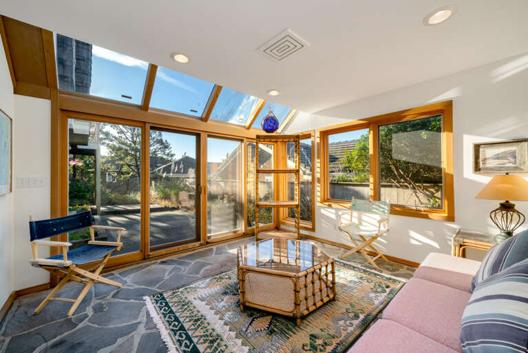Downstairs Sun room with access to back shared patio