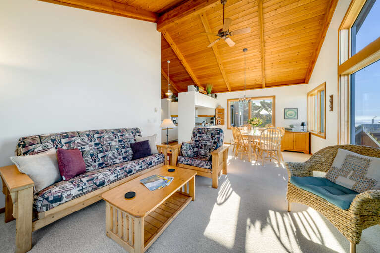 Living area with gas fireplace, Streaming TV, ocean views, Ocean view deck.  