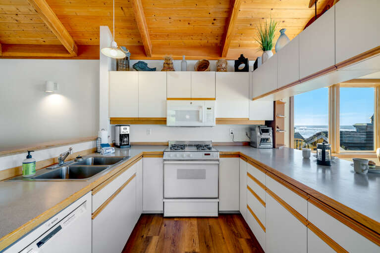 Gorgeous views from the fully equipped kitchen with a breakfast bar. 