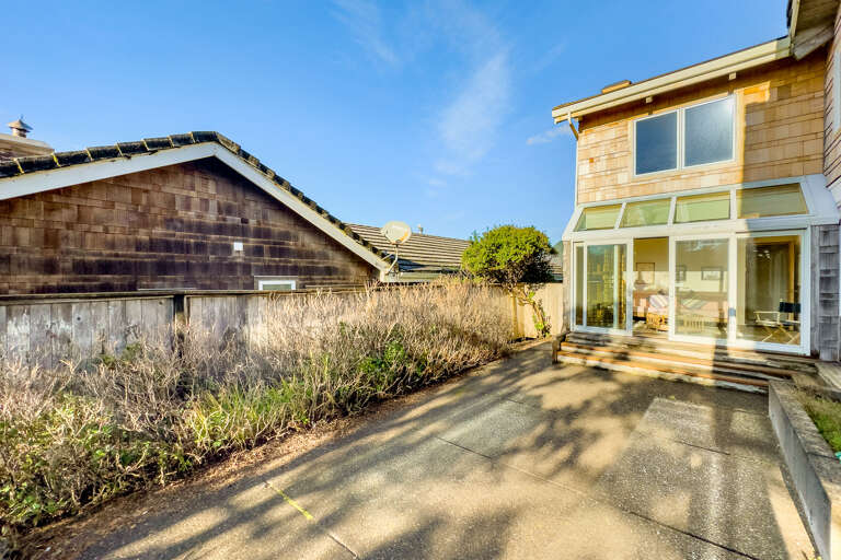Sunroom with access to the shared outdoor patio