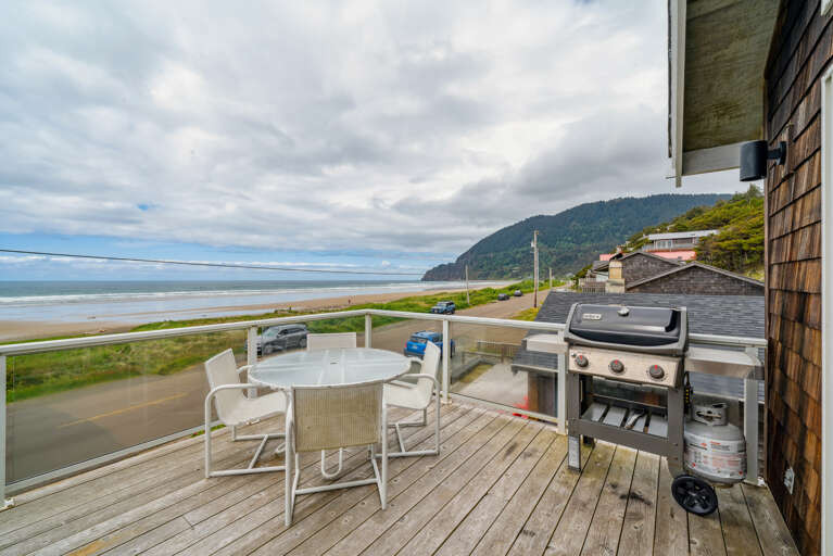 Outdoor firepit and New hot tub, with fenced in hard, and upper deck has wind protected deck with fire table and out door seating