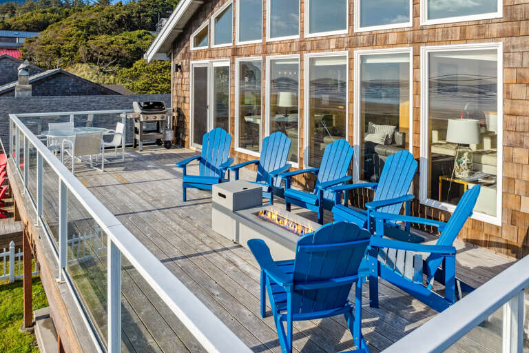 Outdoor firepit and New hot tub, with fenced in hard, and upper deck has wind protected deck with fire table and out door seating