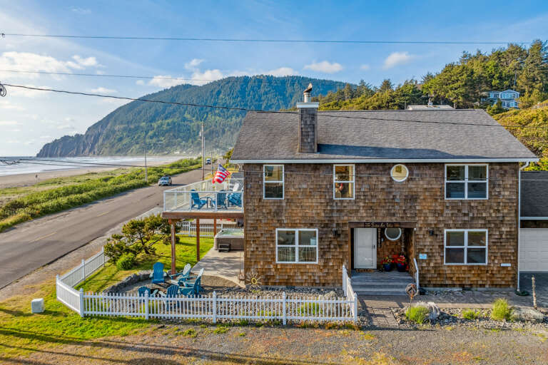 Outdoor firepit and New hot tub, with fenced in hard, and upper deck has wind protected deck with fire table and out door seating