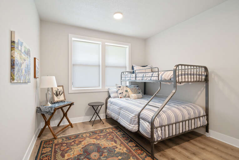 Bunk room with a full and a twin size bed