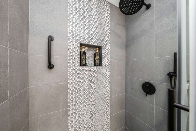 Newly remodeled downstairs bathroom with walk in shower.  Newly remodeled downstairs bathroom with walk in shower.