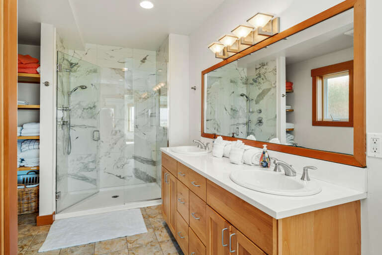 Master bath attached to the King bedroom with a shower and double sinks.