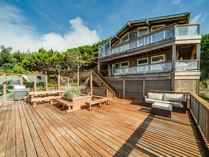 DUPLEX unit. Renters have the lower unit and access to the deck.  Directly across the street from the beach. Garage not accessible.