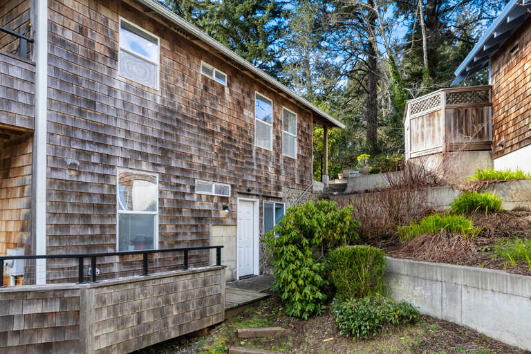 Stairs leading to the lower level access to the house.  Stairs leading to the lower level access to the house.