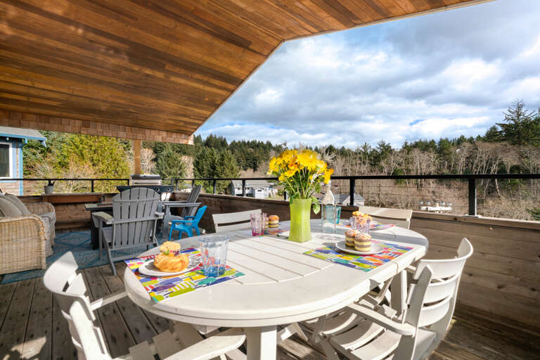 Upper deck with outdoor dining table, lounging furniture, Gas BBQ, Gas Fire table.  Upper deck with outdoor dining table, lounging furniture, Gas BBQ, Gas Fire table.