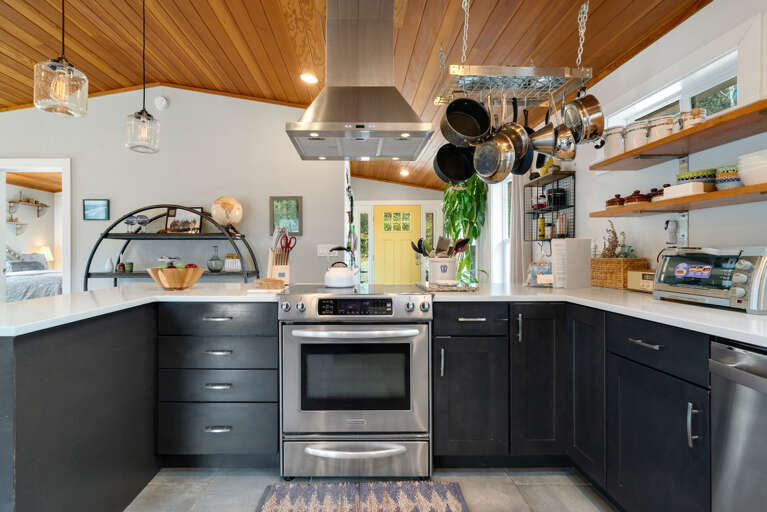 Open Floor plan with Fully equipped Kitchen, Dining table for 6 plus Bar seating. Open to the Living room with Streaming TV, Gas Fireplace, Access to upper deck.  Open Floor plan with Fully equipped Kitchen, Dining table for 6 plus Bar seating. Open to the Living room with Streaming TV, Gas Fireplace, Access to upper deck.