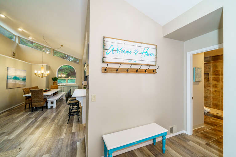 Full bathroom off the entry way with double shower. 