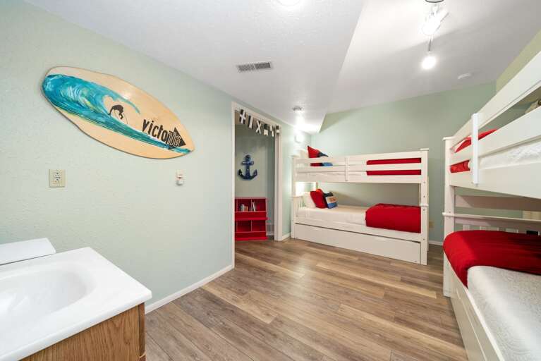 Downstairs bunk room with 2 bunks each with a trundle bed. 