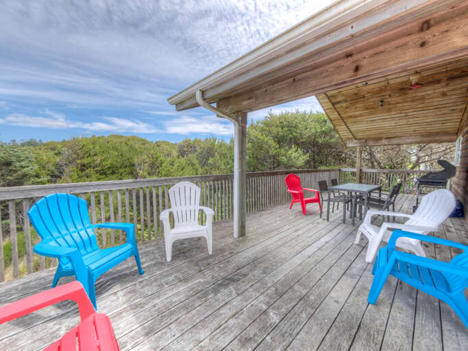 Gas BBQ and covered deck for outdoor dining. Side deck open for sunning and has oceanview. 