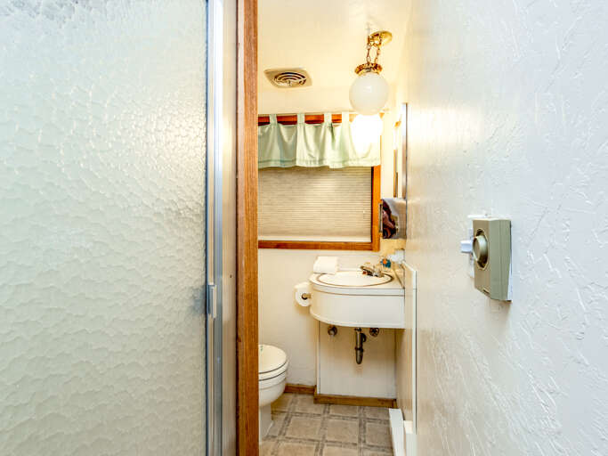 Kids Bathroom, Small stall shower. Not well suited for adults. 