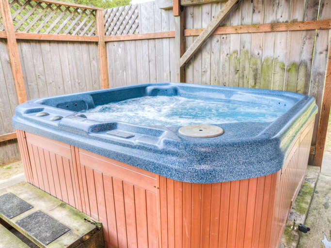 Hot tub just below the deck. 