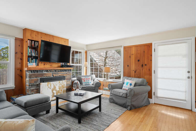 Living room with Dish TV open to dining room Living room with Dish TV open to dining room