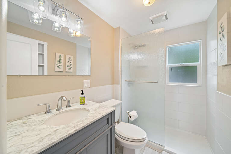 Newly updated bathroom on main floor with walk in shower Newly updated bathroom on main floor with walk in shower