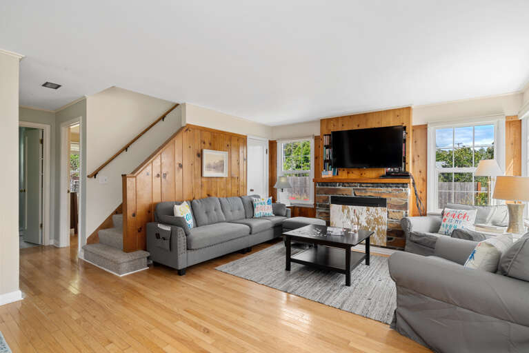 Living room with Dish TV open to dining room Living room with Dish TV open to dining room