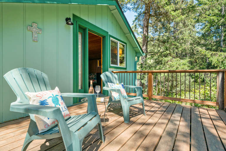 Upper private deck off of loft room with desk and futon. 