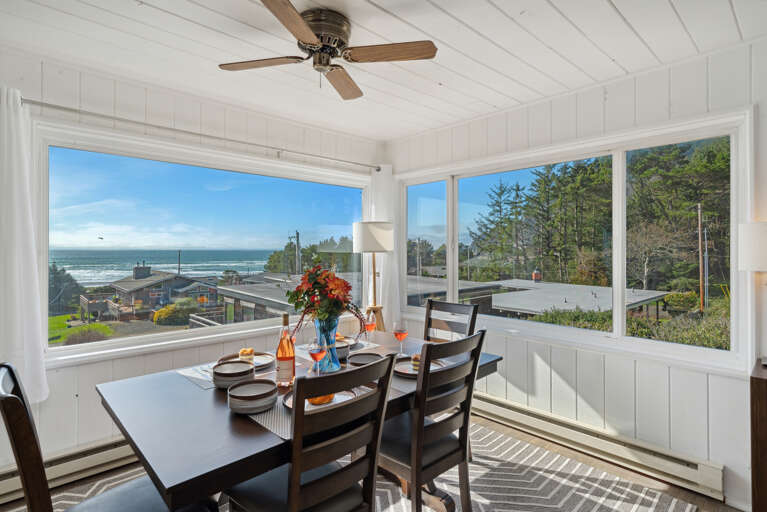 Ocean view dining room with seating for 6-8
