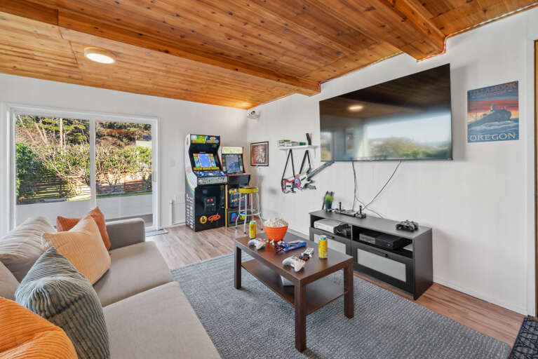 Game room with Arcade games, atari, Xbox, guitar hero, foosball, big connect four and more