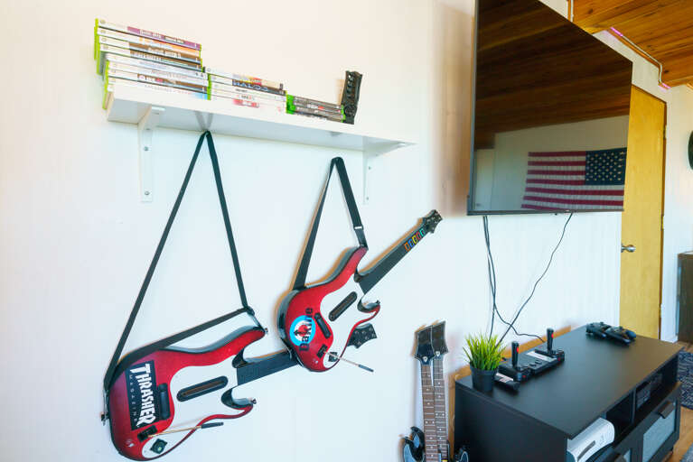 Game room with Arcade games, atari, Xbox, guitar hero, foosball, big connect four and more